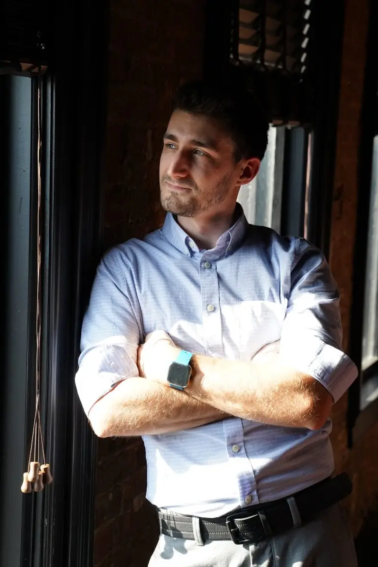 Josiah Leaning Brick Near Window